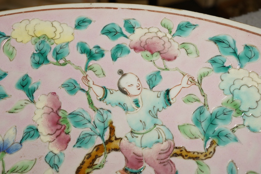 A Chinese enamelled porcelain pink ground ‘boys’ dish, mid 19th century
